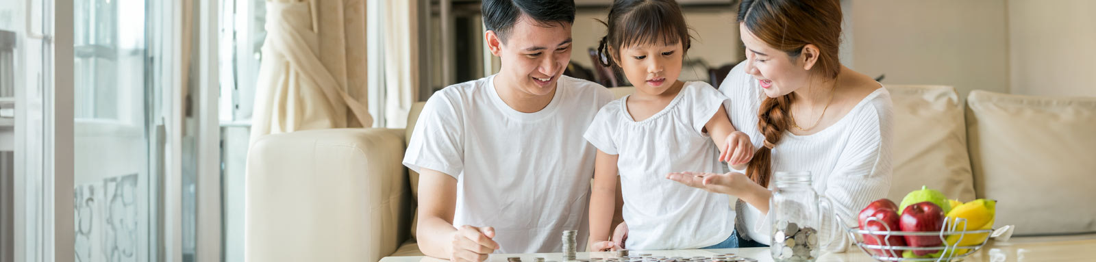 family counting coins