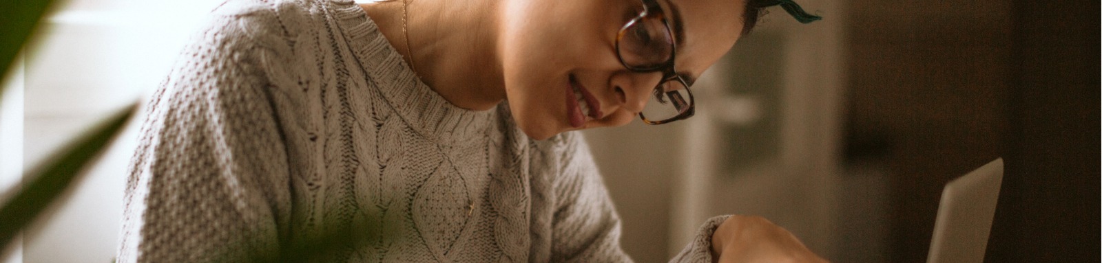 Young woman working at a laptop